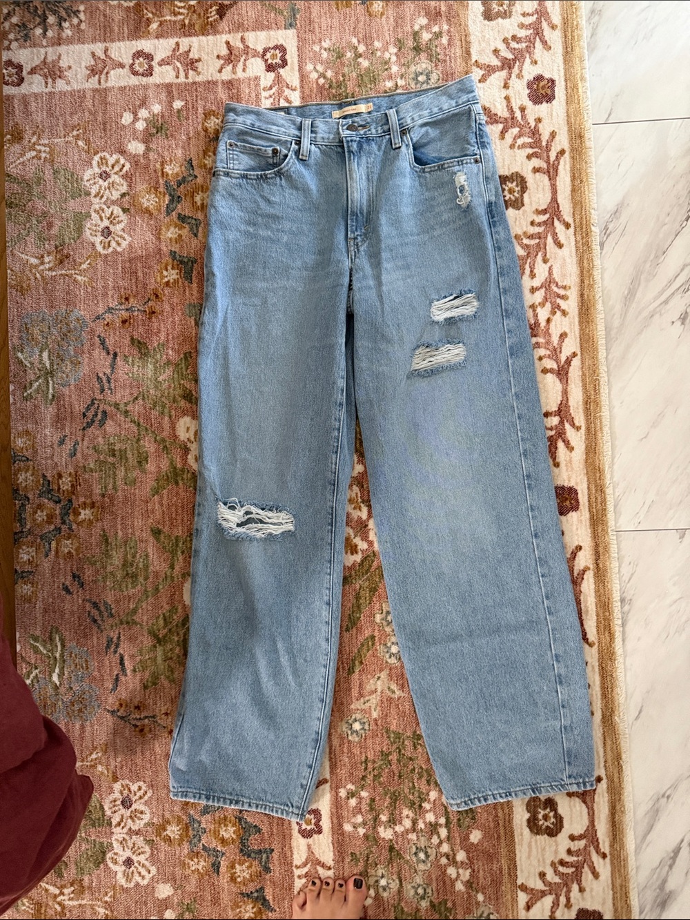 Levi’s Women's Light Blue Distressed jeans